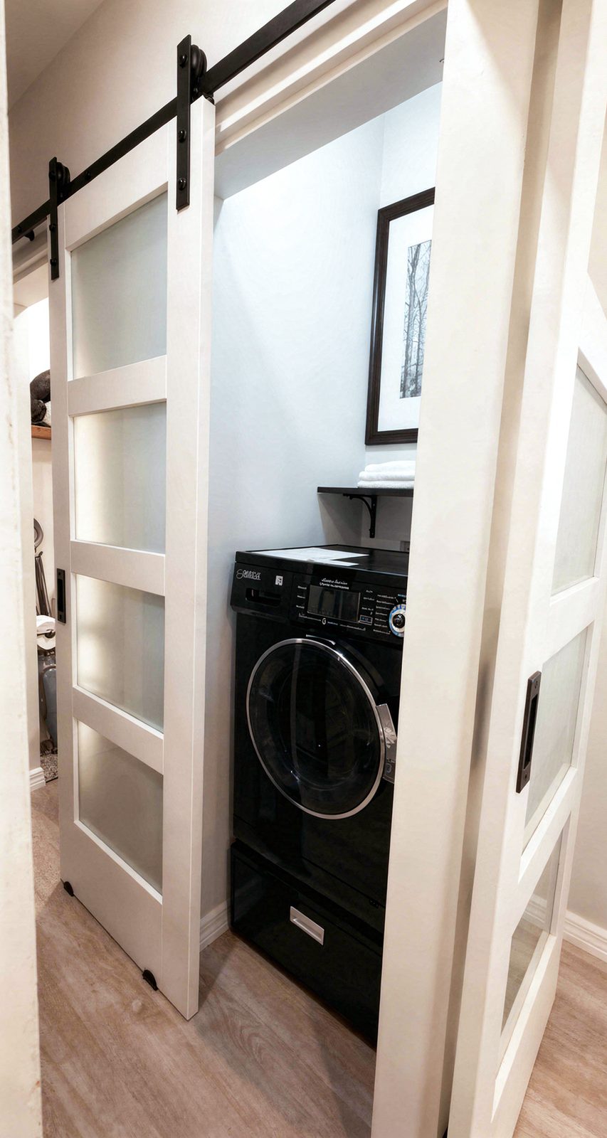 Laundry with barn door, washer dryer